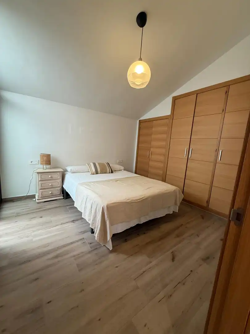 Dormitori de Apartament de lloguer en Málaga amb Aire condicionat i Calefacció