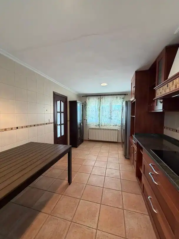 Cuina de Casa adosada en venda en Villaviciosa amb Calefacció, Jardí privat i Terrassa