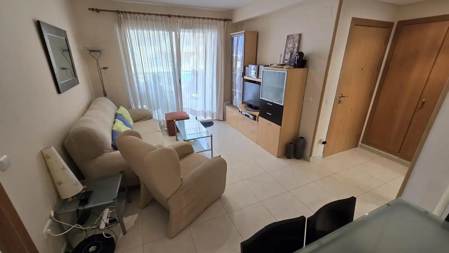Sala de estar de Apartamento de alquiler en Gandia con Terraza, Amueblado y Piscina comunitaria