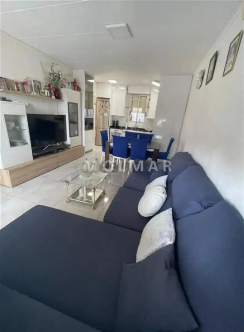 Sala d'estar de Casa o xalet en venda en Almazora / Almassora amb Aire condicionat, Jardí privat i Terrassa