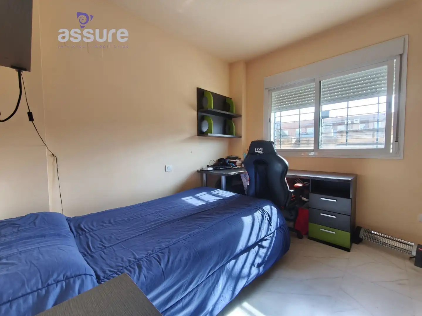 Habitación de Casa adosada en venta en Huelva con Aire acondicionado, Calefacción y Jardín privado