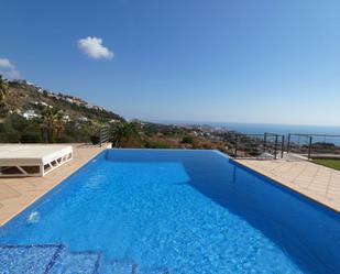 Swimming pool of House or chalet for sale in Benalmádena  with Air Conditioner, Heating and Private garden