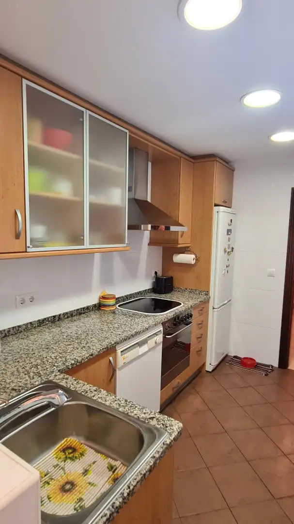 Cuina de Casa adosada en venda en Santa Coloma de Farners amb Calefacció, Jardí privat i Parquet