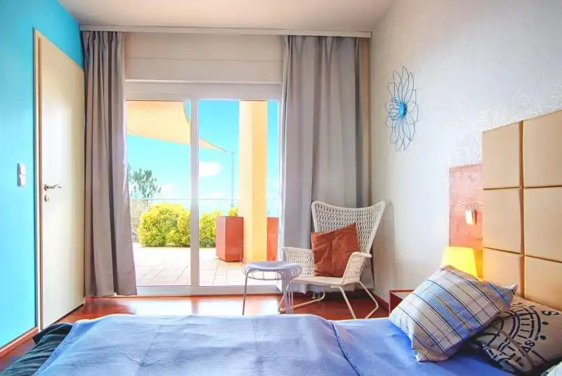 Habitación de Casa o chalet en venta en Lloret de Mar con Calefacción, Jardín privado y Piscina