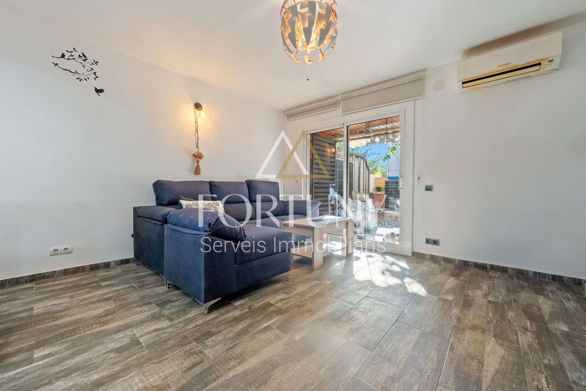 Sala d'estar de Planta baixa en venda en Salou amb Aire condicionat i Jardí privat
