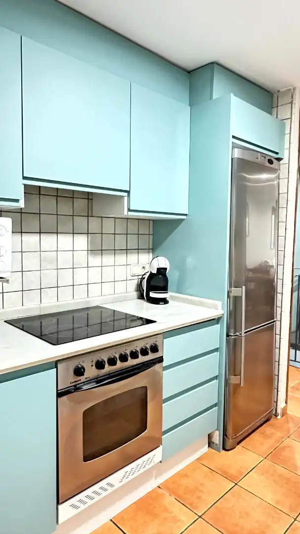 Cuina de Apartament de lloguer en Oliva amb Aire condicionat, Calefacció i Terrassa