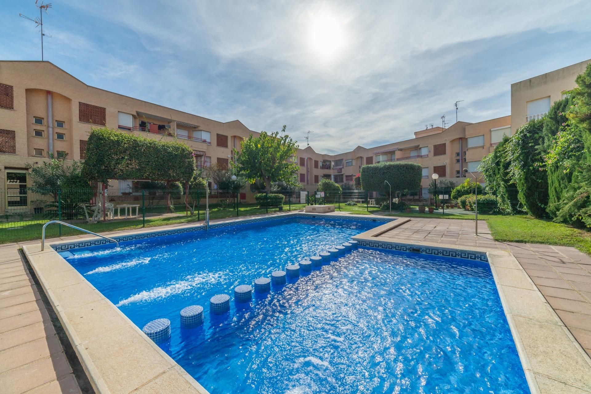 Swimming pool of Flat for sale in San Pedro del Pinatar  with Air Conditioner, Private garden and Storage room