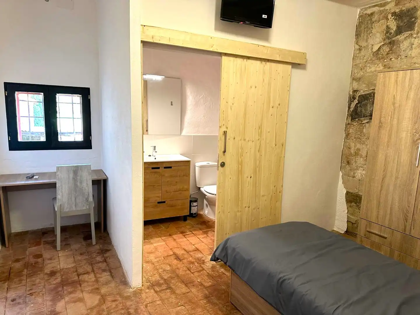 Habitación de Finca rústica de alquiler en Navata con Aire acondicionado, Calefacción y Jardín privado