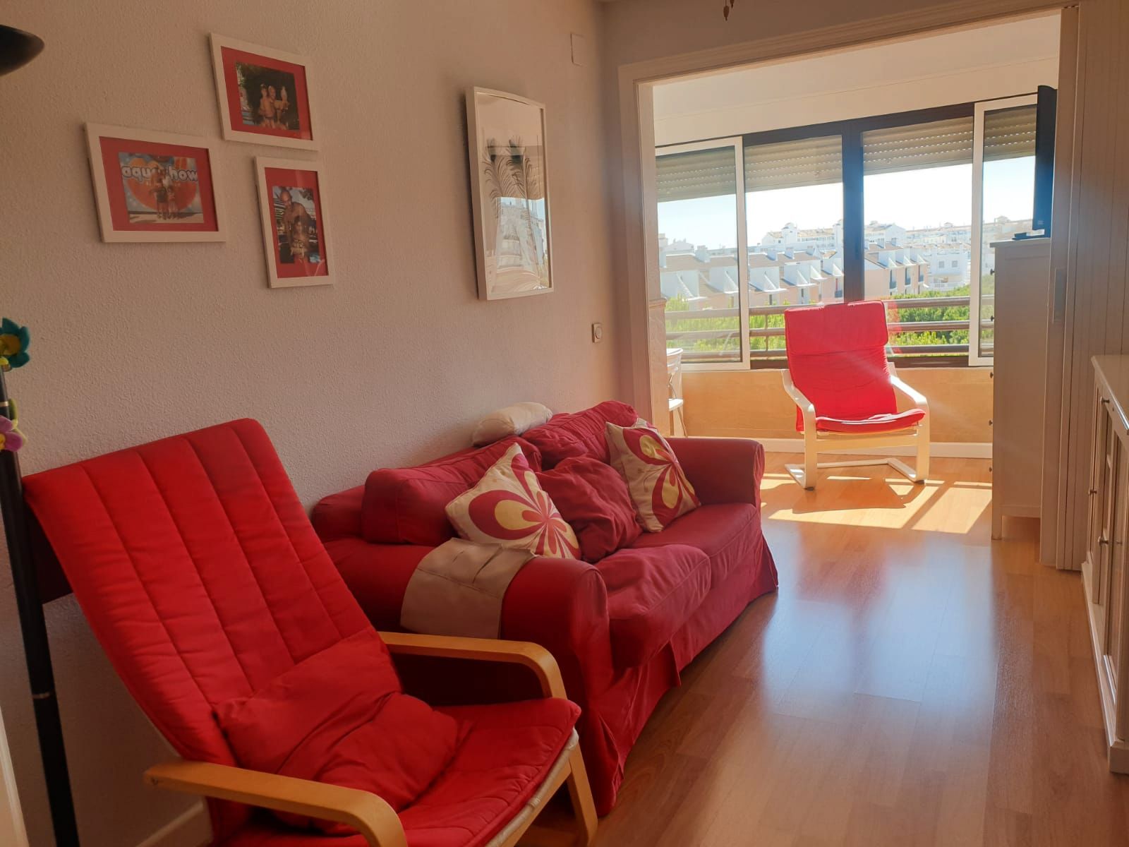 Sala d'estar de Apartament en venda en El Portil amb Terrassa, Moblat i Piscina comunitària