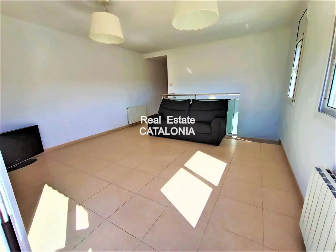 Sala de estar de Casa adosada en venta en Lloret de Mar con Calefacción, Jardín privado y Terraza