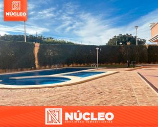 Swimming pool of Flat for sale in Torrevieja  with Air Conditioner, Oven and Washing machine