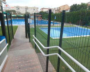 Swimming pool of Single-family semi-detached for sale in  Sevilla Capital  with Terrace and Balcony