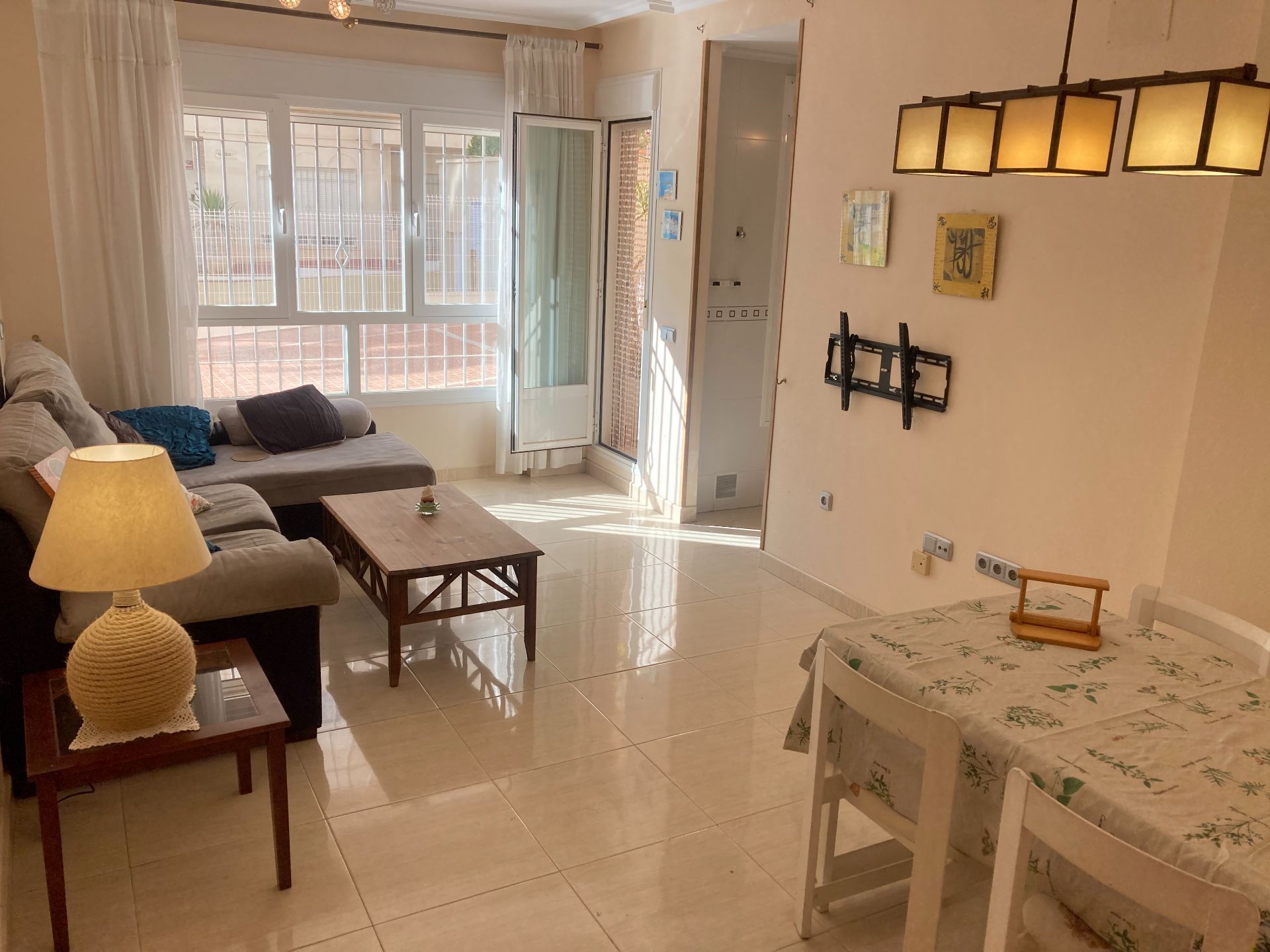 Living room of Flat for sale in Roquetas de Mar  with Air Conditioner, Terrace and Swimming Pool