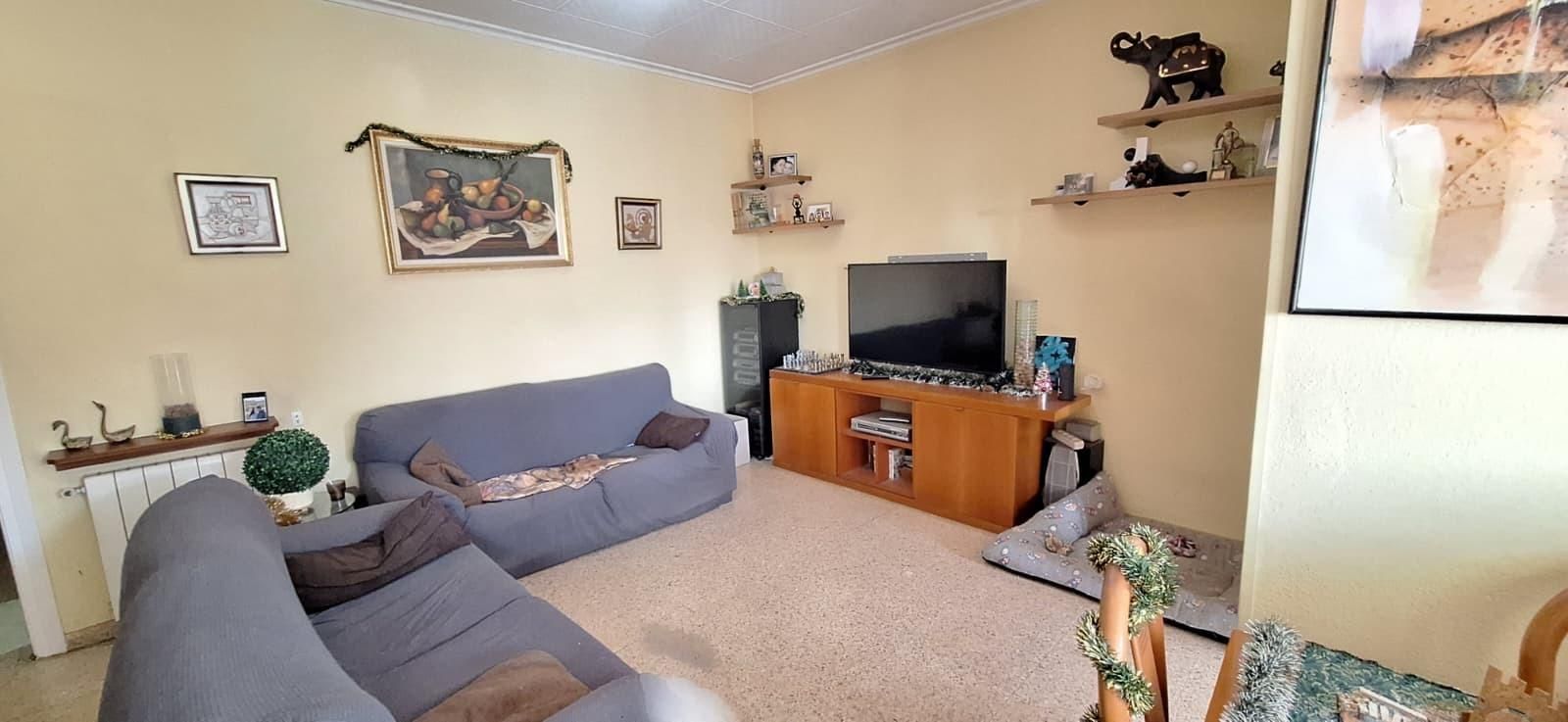 Sala d'estar de Casa o xalet en venda en Sabadell amb Aire condicionat, Jardí privat i Terrassa