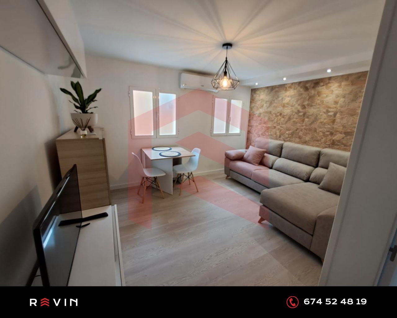 Sala de estar de Apartamento de alquiler en  Jaén Capital con Aire acondicionado, Parquet y Amueblado