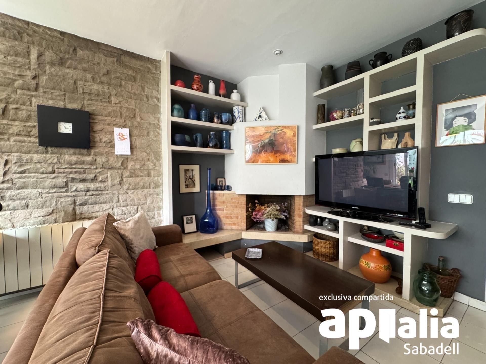 Sala d'estar de Casa adosada en venda en Sabadell amb Aire condicionat, Calefacció i Terrassa