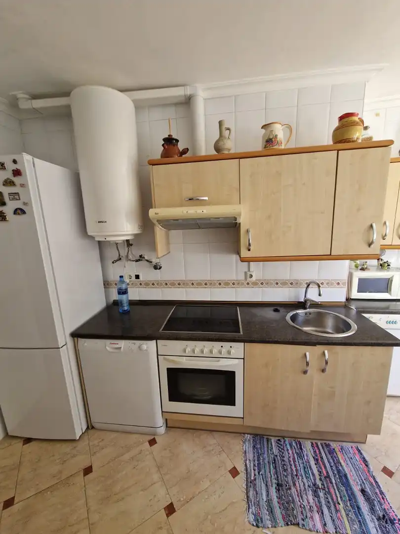 Kitchen of Flat for sale in Oviedo   with Heating, Parquet flooring and Terrace