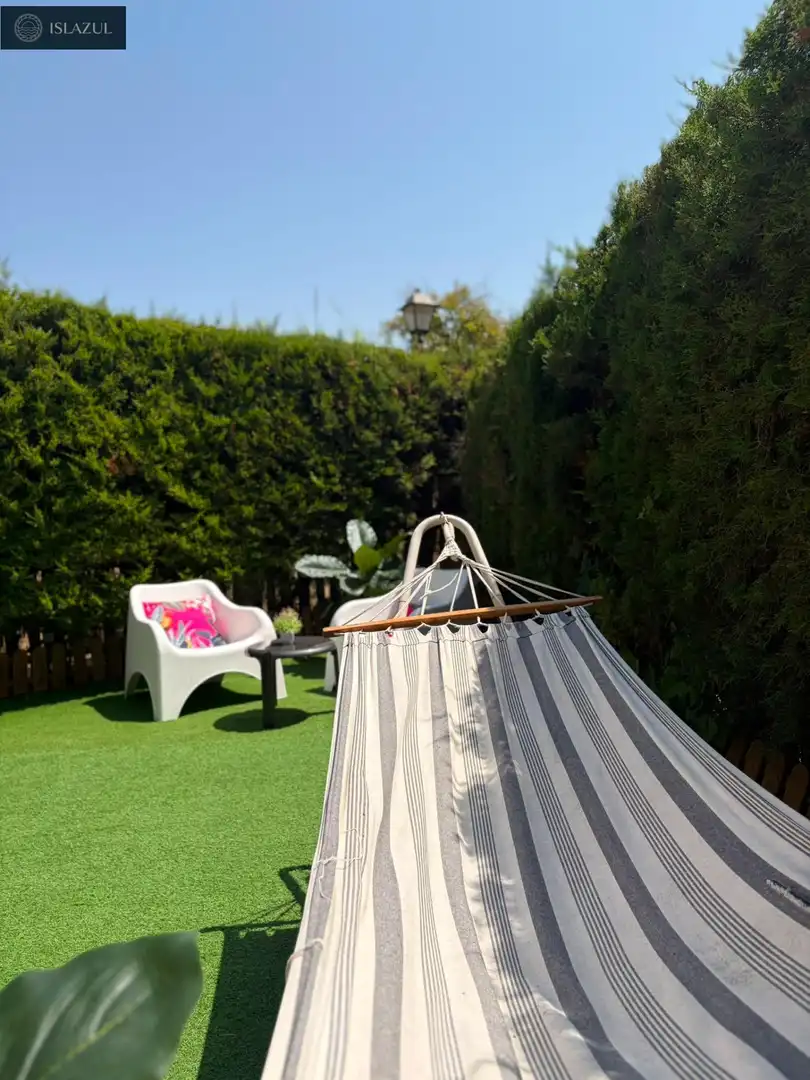 Garten von Einfamilien-Reihenhaus zum Verkauf in Islantilla mit Privatgarten, Terrasse und Abstellraum