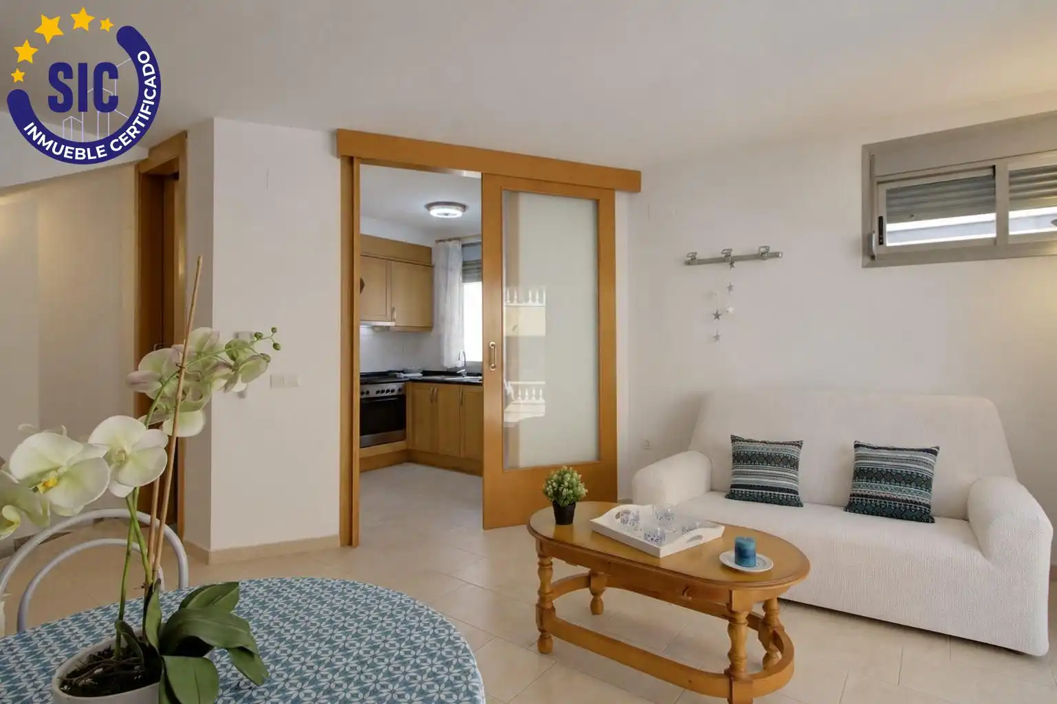 Sala de estar de Casa adosada en venta en Chilches / Xilxes con Jardín privado, Terraza y Amueblado