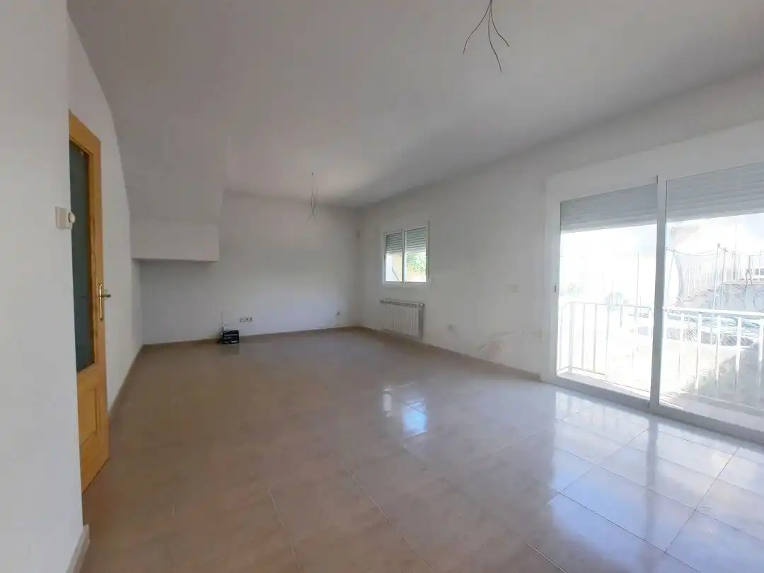 Sala d'estar de Casa adosada en venda en Escalona amb Calefacció i Alarma