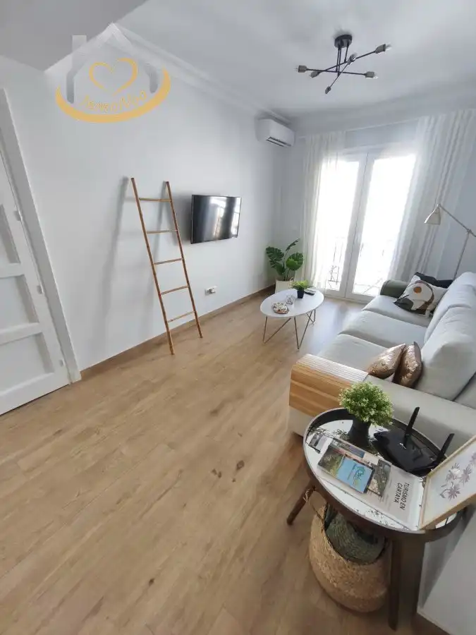 Sala de estar de Piso en venta en Cartaya con Aire acondicionado, Trastero y Amueblado