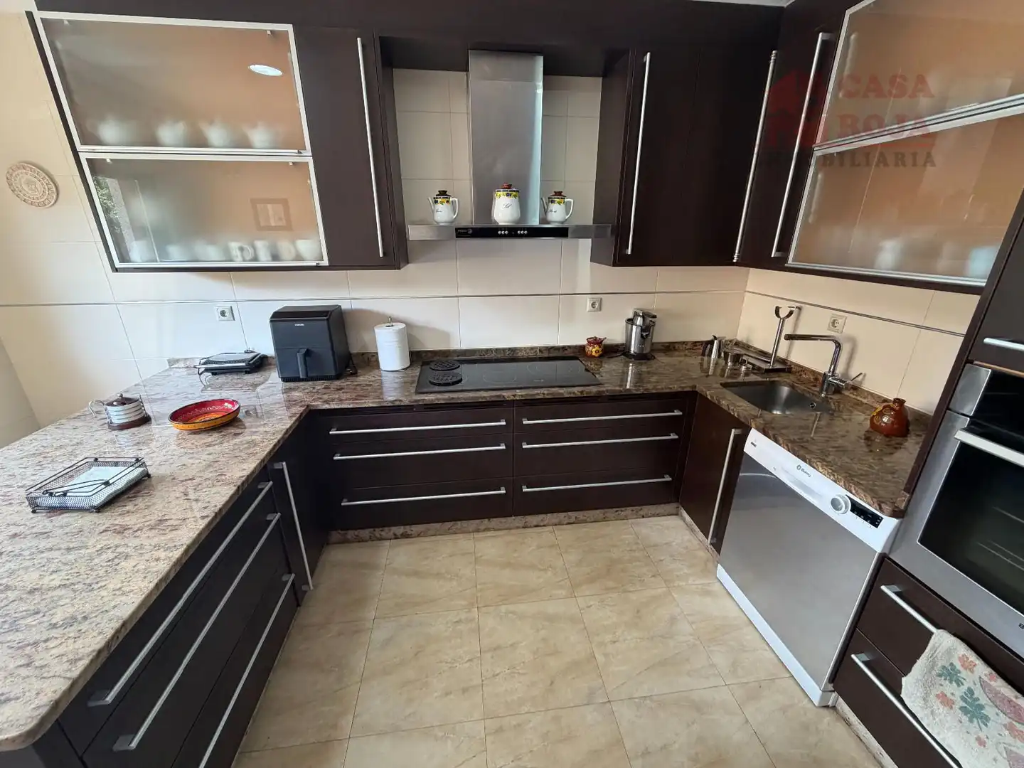 Cuina de Casa adosada en venda en Cangas  amb Calefacció, Parquet i Traster