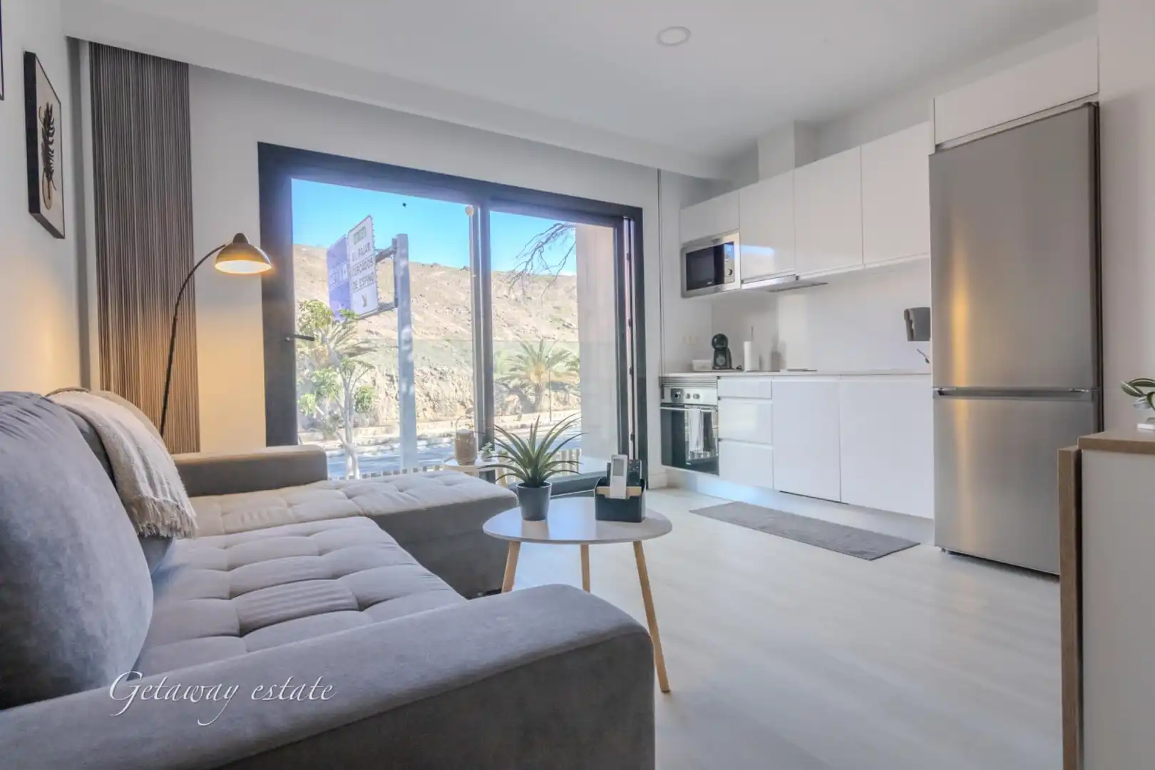 Living room of Apartments for sale in Mogán  with Air Conditioner and Furnished