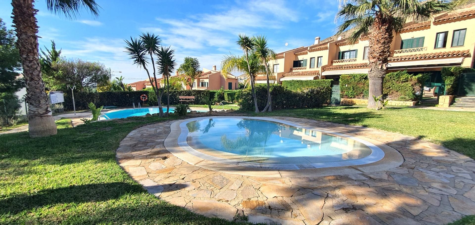 Swimming pool of Single-family semi-detached for sale in Finestrat  with Air Conditioner, Heating and Private garden