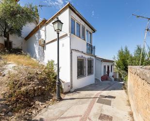 Exterior view of House or chalet for sale in  Granada Capital  with Terrace and Balcony