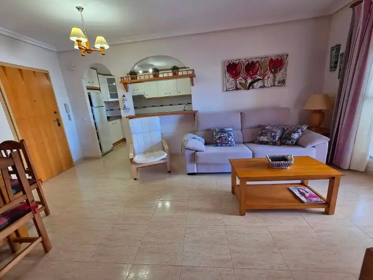Sala de estar de Apartamento en venta en La Manga del Mar Menor con Terraza, Amueblado y Piscina comunitaria