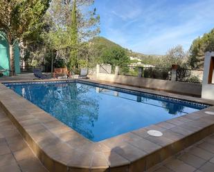 Piscina de Casa o xalet en venda en Quatretondeta amb Calefacció, Jardí privat i Terrassa