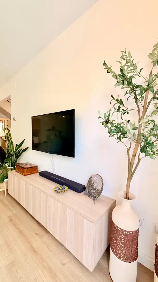Sala d'estar de Casa adosada en venda en Cunit amb Aire condicionat, Calefacció i Jardí privat