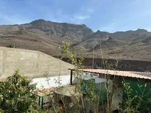 Vista exterior de Casa adosada en venda en Mogán amb Jardí privat, Piscina i Moblat