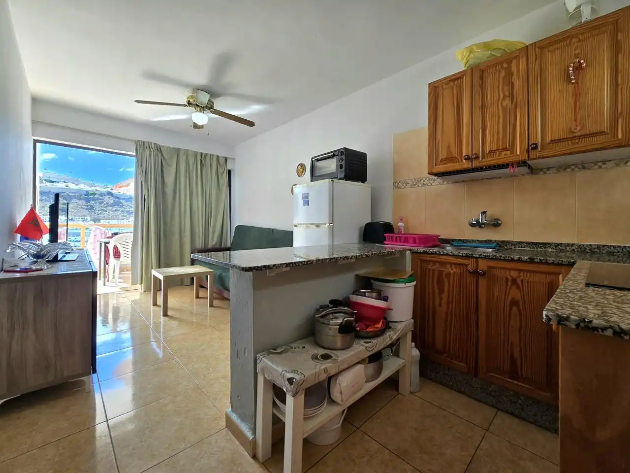 Cuina de Apartament en venda en Mogán amb Moblat, Balcó i Piscina comunitària