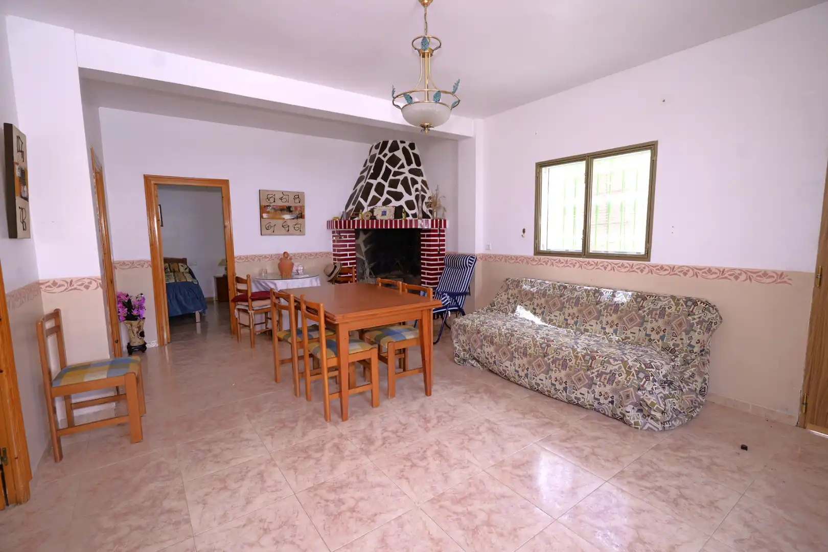 Sala d'estar de Casa o xalet en venda en Nevada amb Jardí privat, Terrassa i Moblat