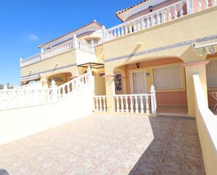 Vista exterior de Casa adosada en venda en Orihuela amb Terrassa i Piscina comunitària