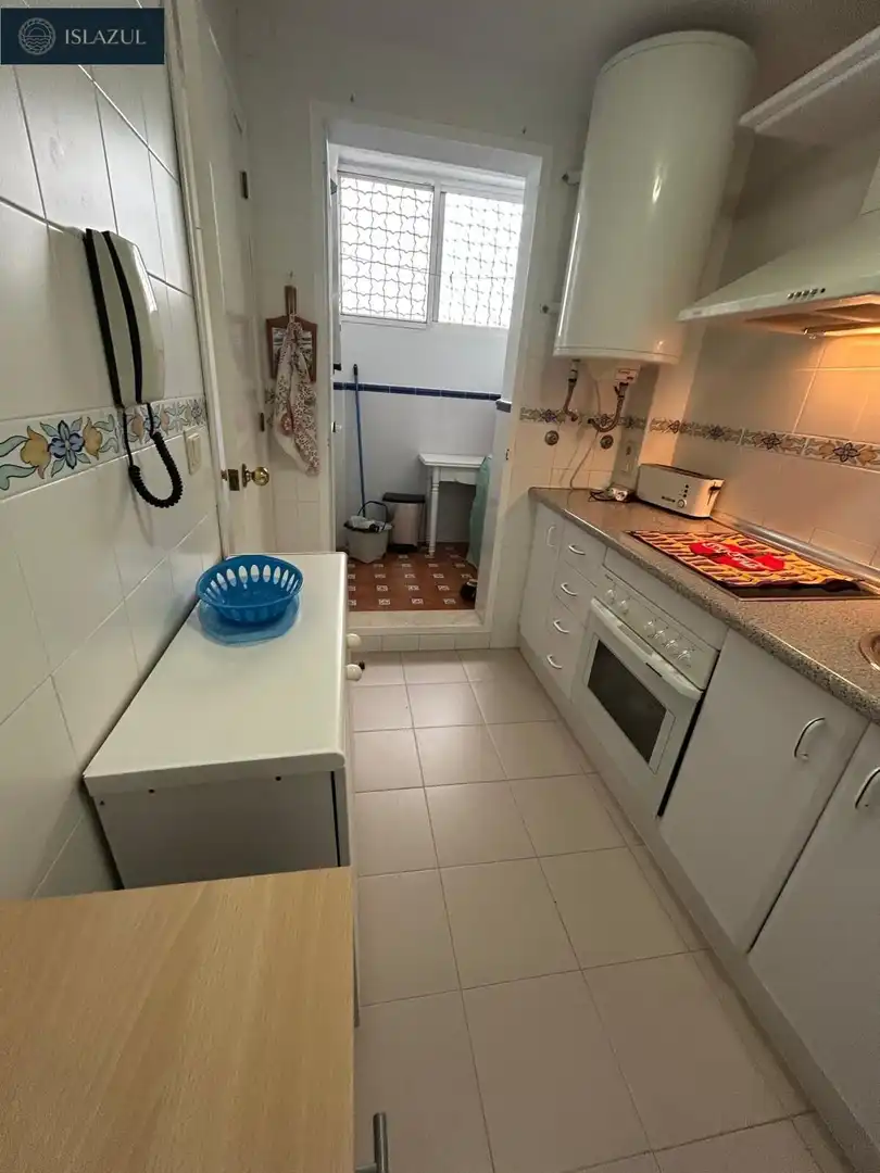 Cuina de Casa adosada en venda en Isla Cristina amb Terrassa, Traster i Moblat