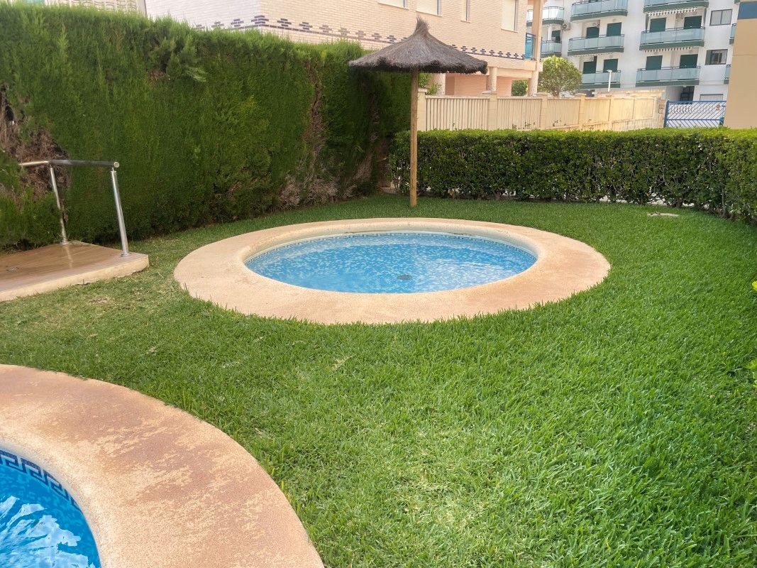 Swimming pool of Apartment for sale in Guardamar de la Safor  with Air Conditioner, Private garden and Terrace