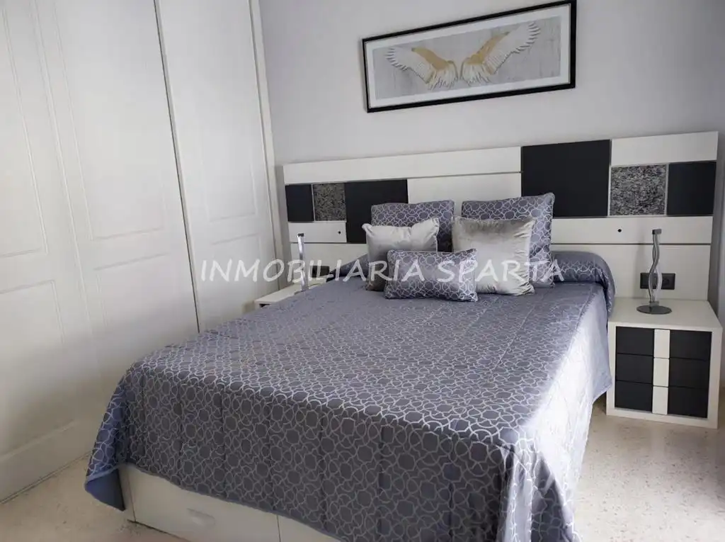 Habitación de Casa adosada en venta en Coria del Río con Aire acondicionado, Terraza y Trastero