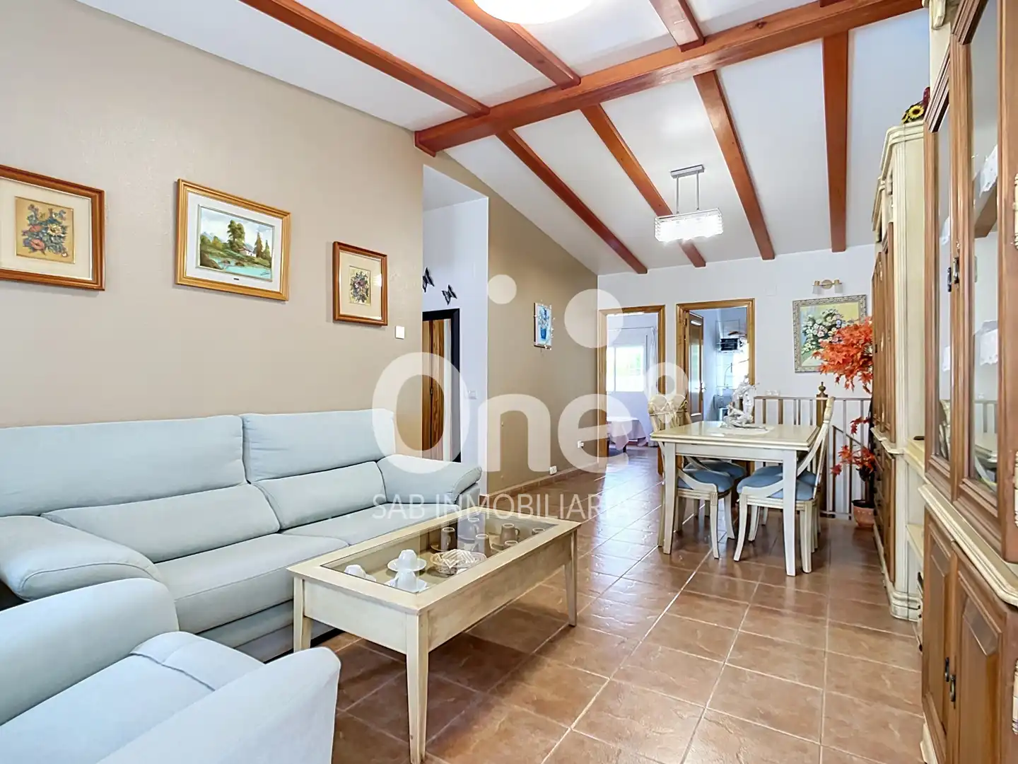Sala d'estar de Casa adosada en venda en La Pobla de Vallbona amb Aire condicionat, Jardí privat i Terrassa