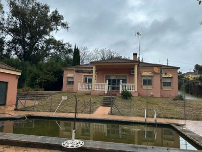 Exterior view of House or chalet for sale in La Puebla del Río  with Air Conditioner, Swimming Pool and Community pool