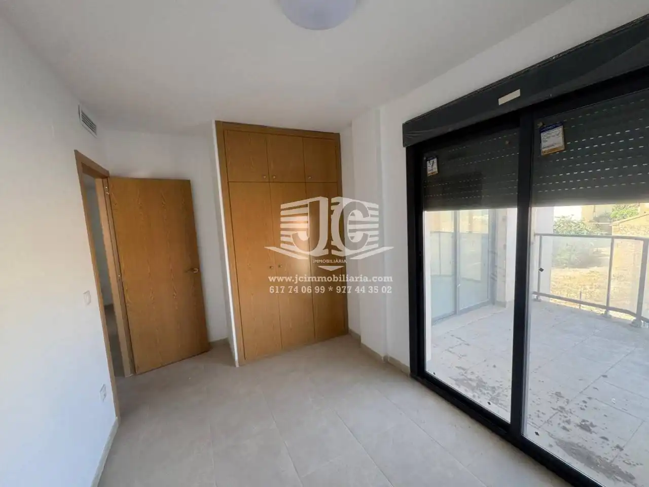 Bedroom of Flat for rent in L'Aldea  with Air Conditioner, Terrace and Storage room