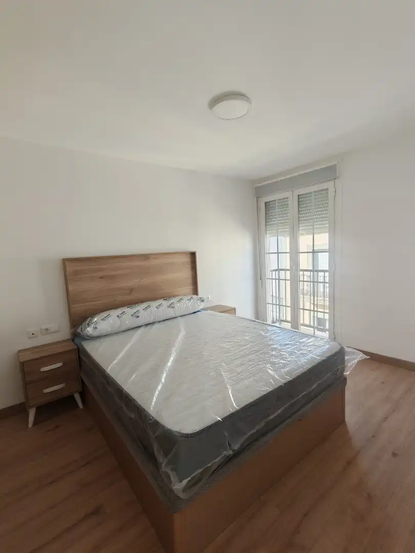 Dormitori de Apartament de lloguer en Almendralejo amb Moblat i Rentadora