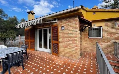 Vista exterior de Casa o xalet en venda en Calafell amb Aire condicionat, Calefacció i Jardí privat