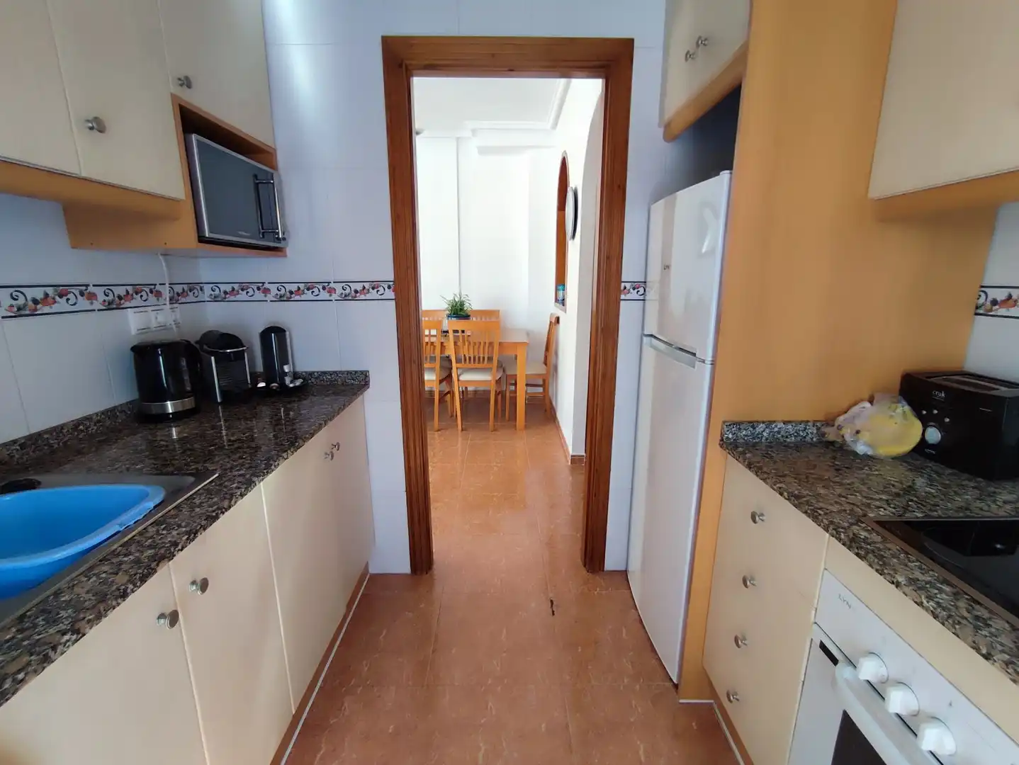 Küche von Einfamilien-Reihenhaus zum Verkauf in Orihuela mit Klimaanlage, Terrasse und Möbliert