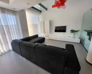 Sala d'estar de Casa adosada en venda en Bellreguard amb Aire condicionat, Terrassa i Balcó