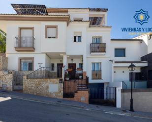 Vista exterior de Casa adosada en venda en Santa Cruz del Comercio amb Jardí privat i Terrassa