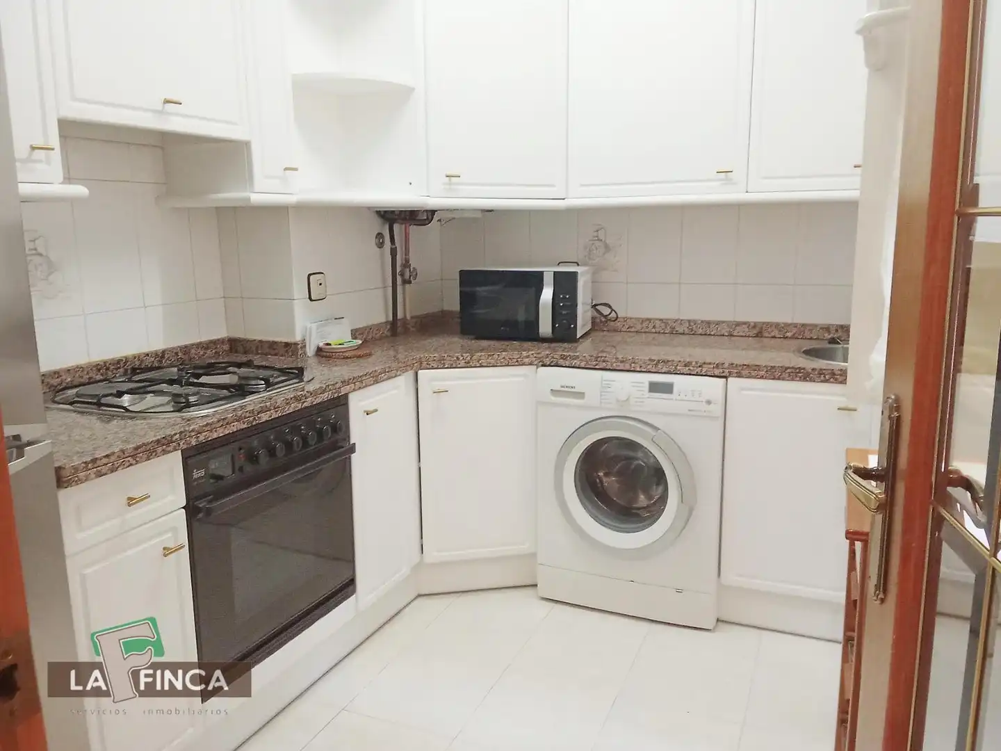 Kitchen of Flat for sale in Oviedo   with Heating, Parquet flooring and Furnished