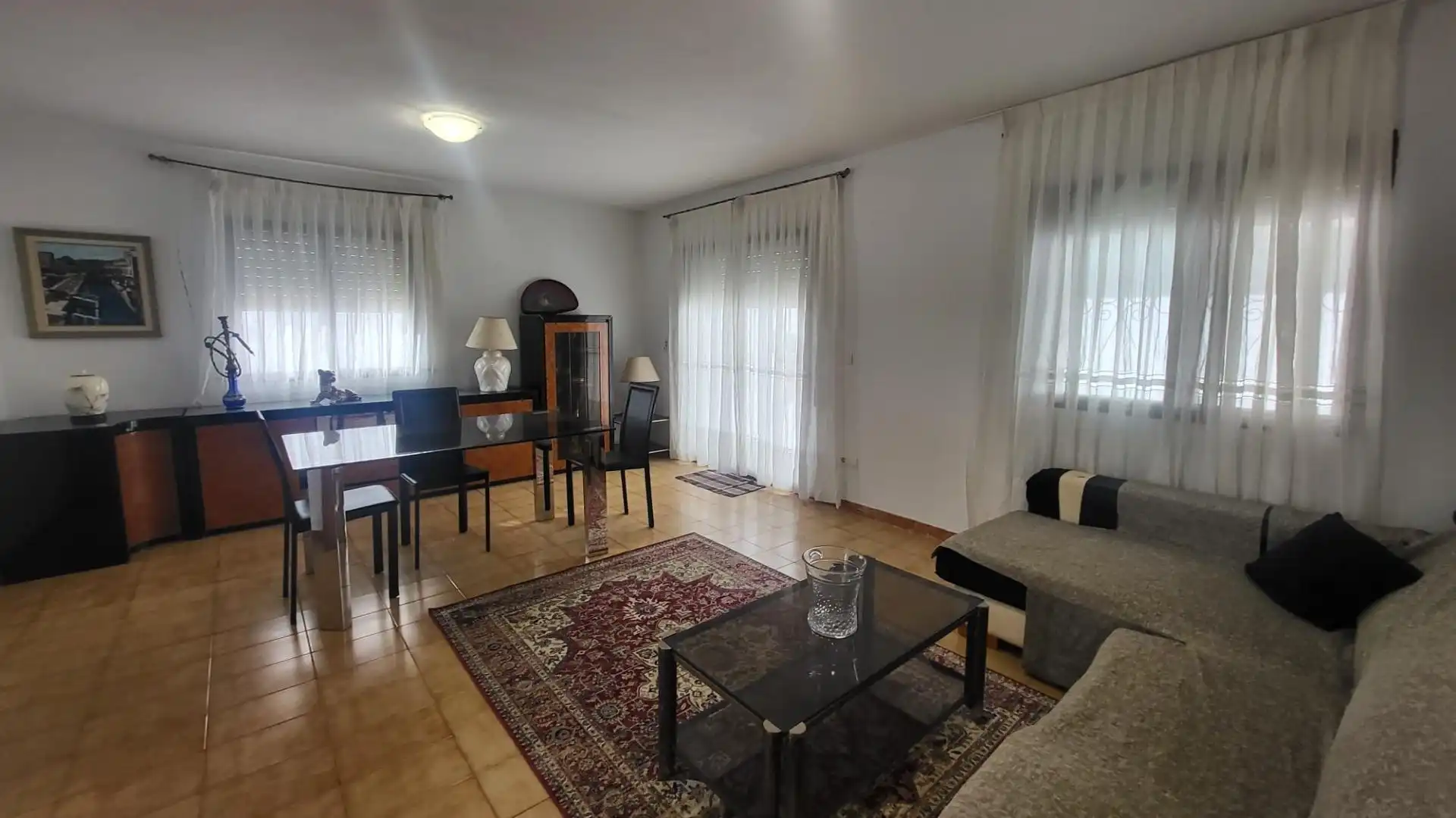 Sala d'estar de Casa adosada de lloguer en Gandia amb Aire condicionat, Calefacció i Jardí privat
