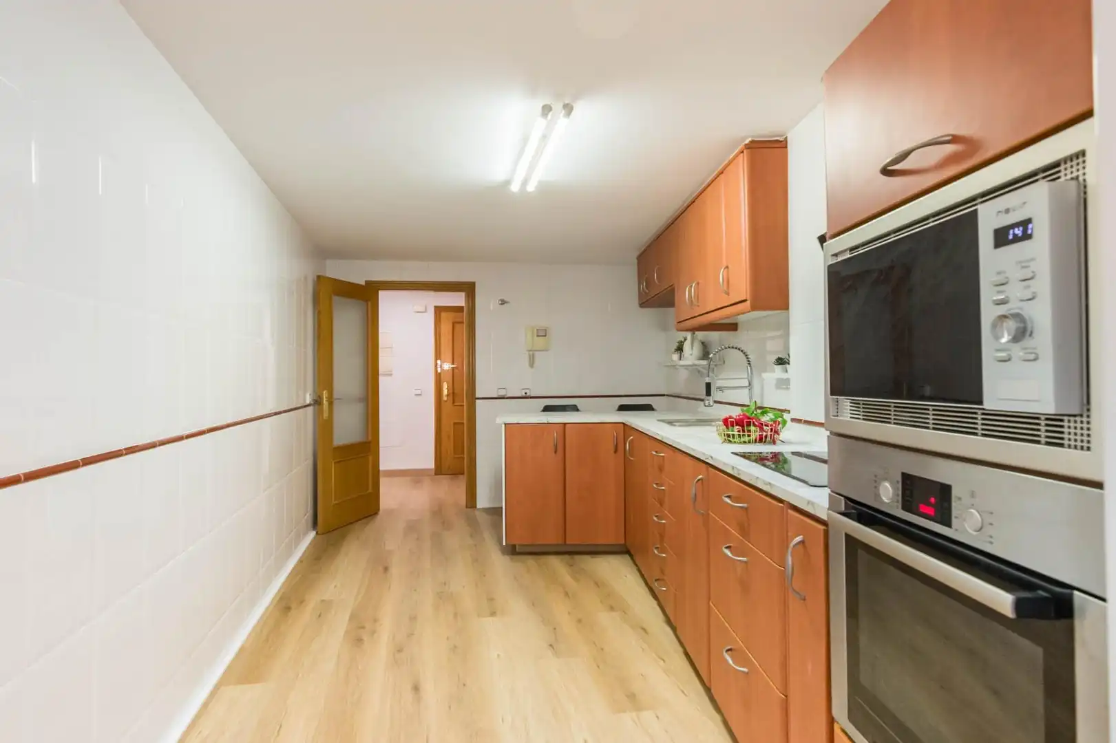 Küche von Wohnung zum Verkauf in Santomera mit Klimaanlage, Privatgarten und Abstellraum